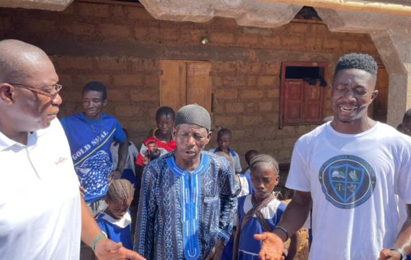 Sylvester with the people of Magbaikoli Village