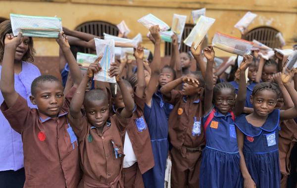 Kids with pencil pouches at the 2025 Year of The Pencil Campaign by Develop Africa