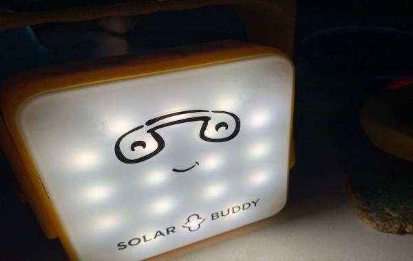 SolarBuddy lamp on a table - Sierra Leone, July 2026