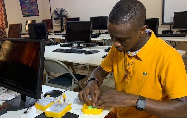 Staff Coupling Solar Buddy Lamps - Sierra Leone