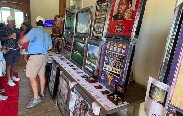 Display of various art at the Swing FORE Change 2026