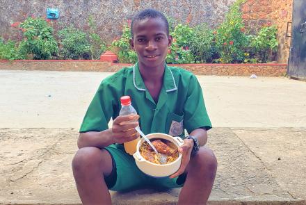 Boy with school lunch