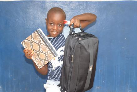Student with School Supplies