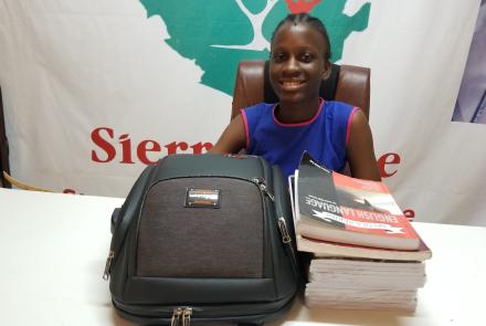 Girl with Exam Preparation Books