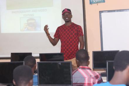 Joseph Teaching the Mentees about Photography