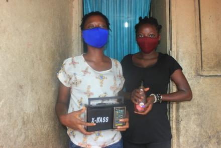 Lucy & Elizabeth with masks and a radio