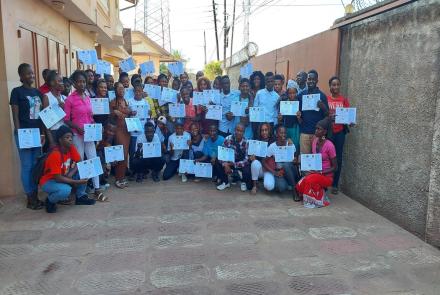 Fifty-nine Computer Students with Certificates of Completion