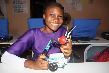 Girl with Robot Created Lego STEM Session
