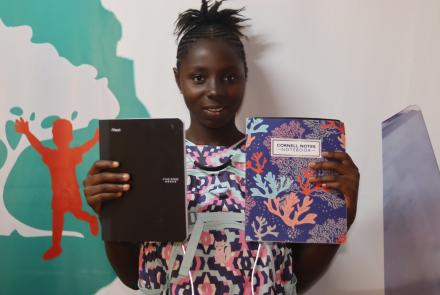 Isha with her new school supplies