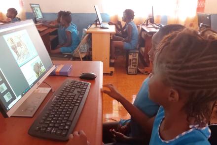 Loretta & Blessing reading "Brown" in class