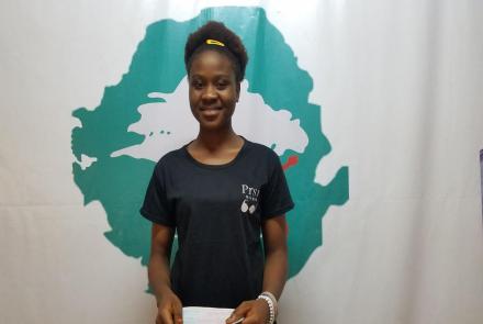 Mariama receiving tuition for college