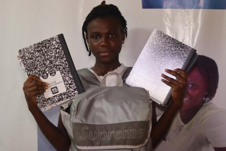 Numu with her school supplies