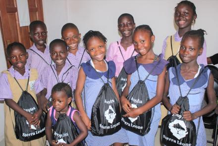 Students with School Supplies