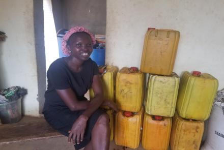 Susan with her Palm Oil Business