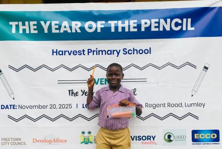 A happy kid with his pencil pouch