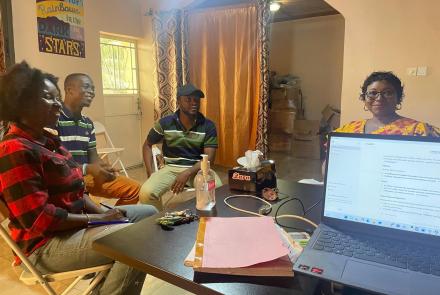 Board member and staff in a meeting Sierra Leone