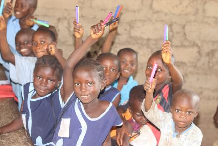 Students with their new pencils