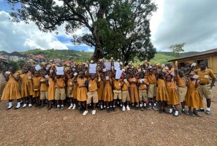 Kids with SolarBuddy lamps at REC primary School, Sierra Leone - July 2026