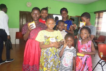 Kids with SolarBuddy lamp - Sierra Leone July, 2026