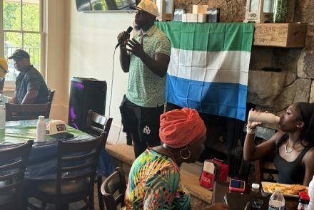 Mo Sanu giving speech at the Swing FORE Change 2026