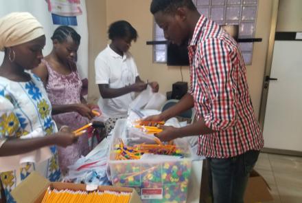 Volunteers packing pencils for the Year of the Pencil Campaign