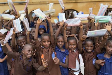 Students with pencils at a school in Sierra Leone