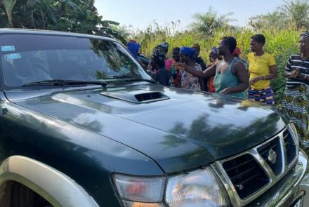 Sylvester being welcomed by the people of Magbaikoli village